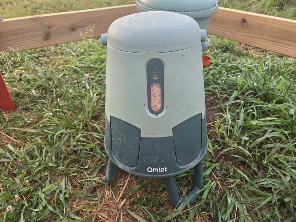 Omlet Smart No Waste automatic feeder with feed visible in its level window